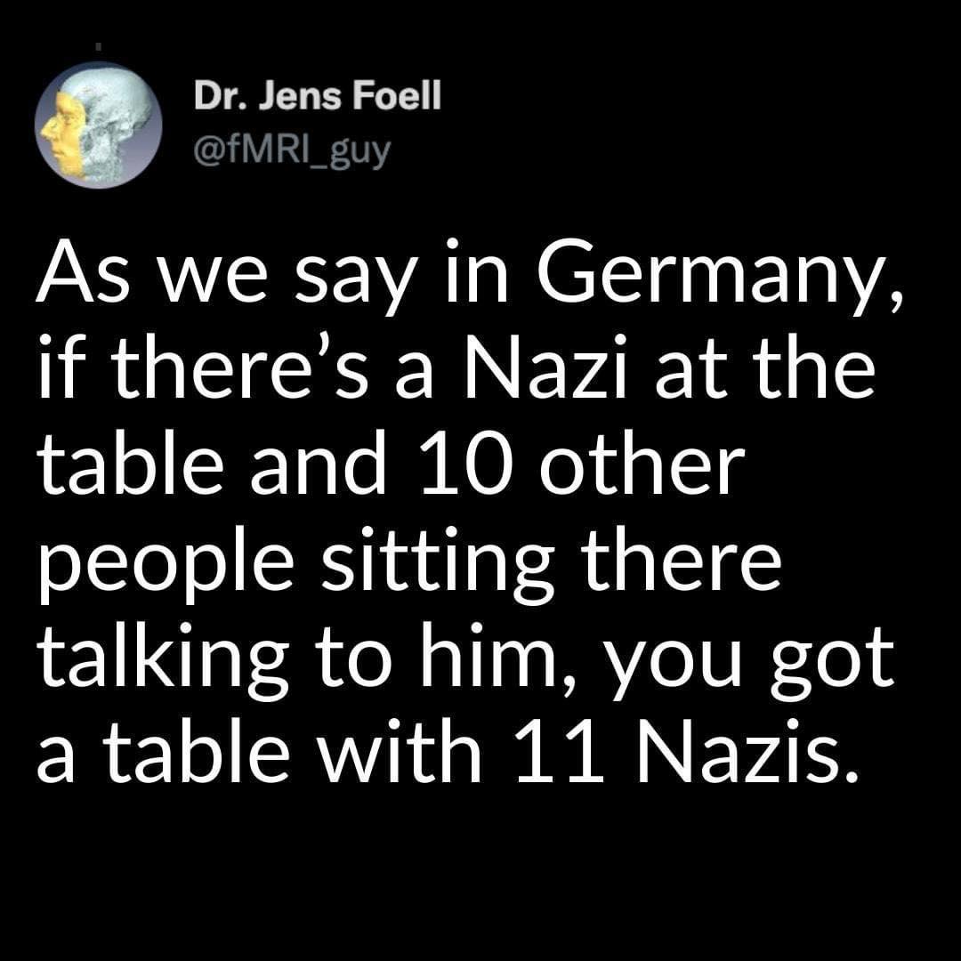 A tweet by "@fMRI_guy" 'As we say in Germany, if there's a Nazi at the table and 10 other people sitting there talking to him, you got a table with 11 Nazis.'